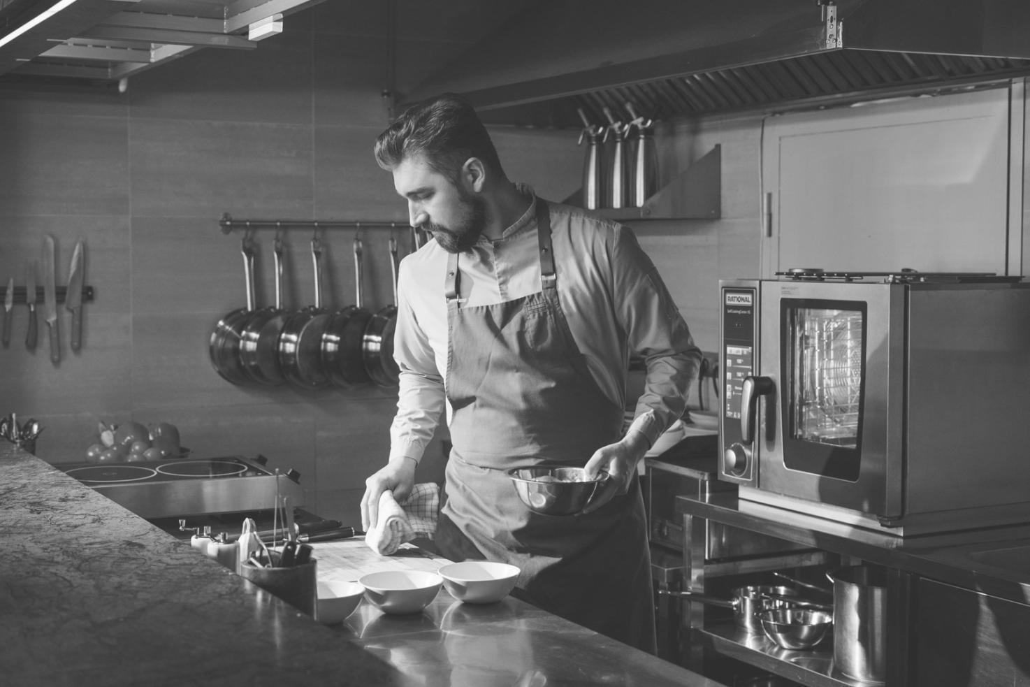 Chef preparing an exquisite dish with advanced techniques